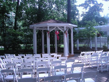 wedding gazebo decorated with ribbons and paper lantern