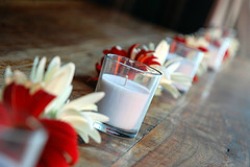 glass votives and flower centerpieces