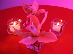 pink orchid and candle table decoration
