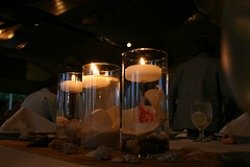 cylinder vase with floating candle centrepiece