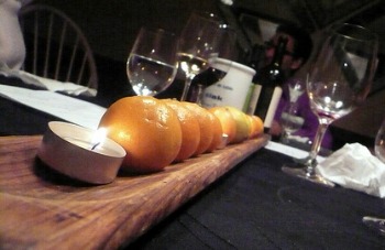 orange and candles fruit wedding centerpiece